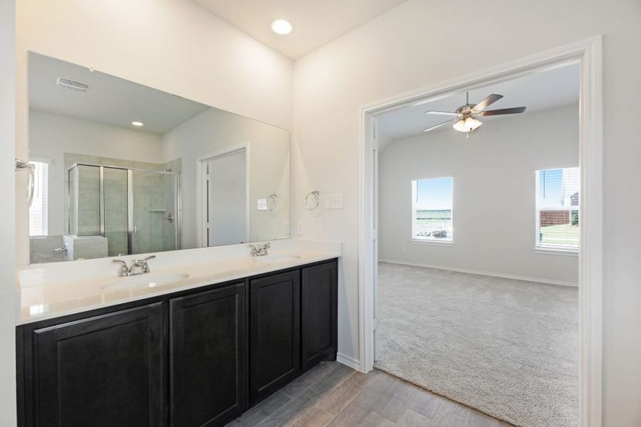 Representative exterior photo of a completed home built from the Lockhart by Impression Homes in Heartland, Heartland, TX (Image 23).