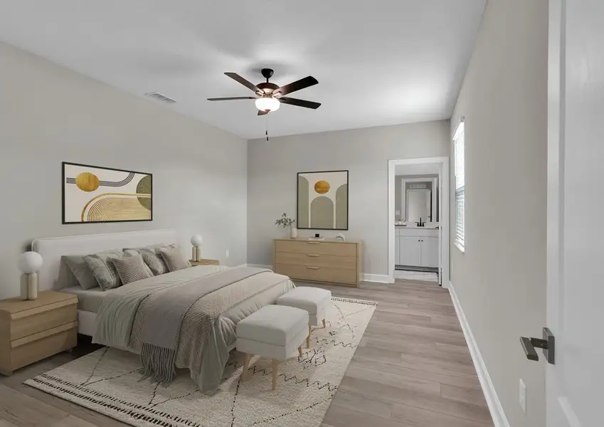 Cozy up with a good book in the master bedroom