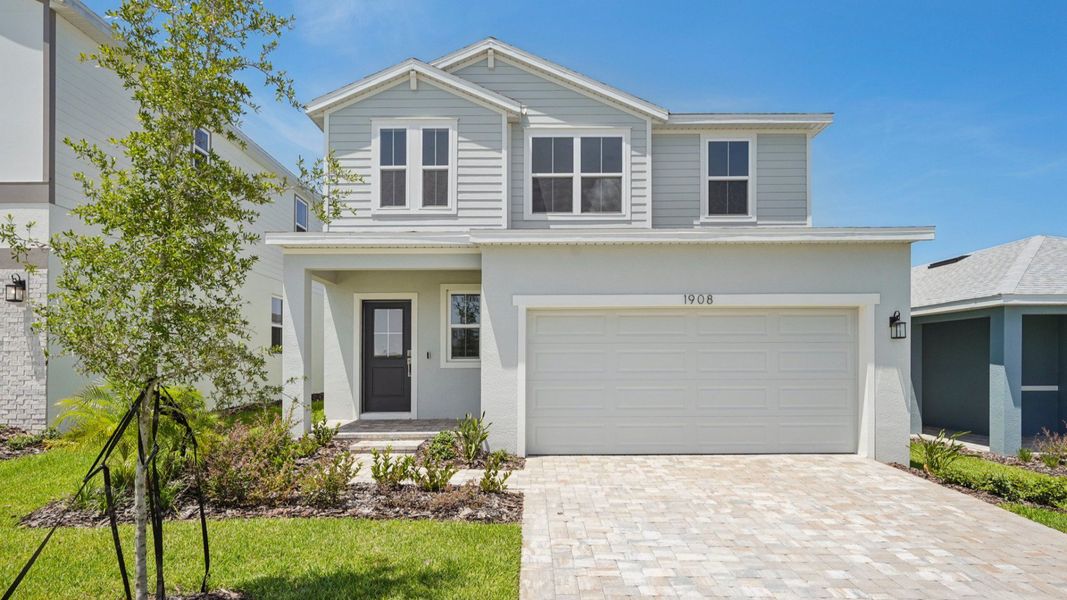 Representative exterior photo of a completed home built from the Jupiter by DRB Homes in Hamilton Bluff, Haines City, FL (Image 20).