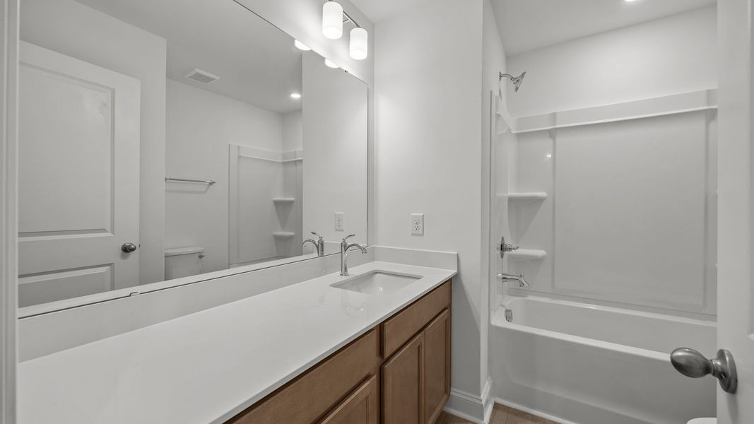 Furnished interior view inside a new home in Bell Glen, Charlotte (Image 17).