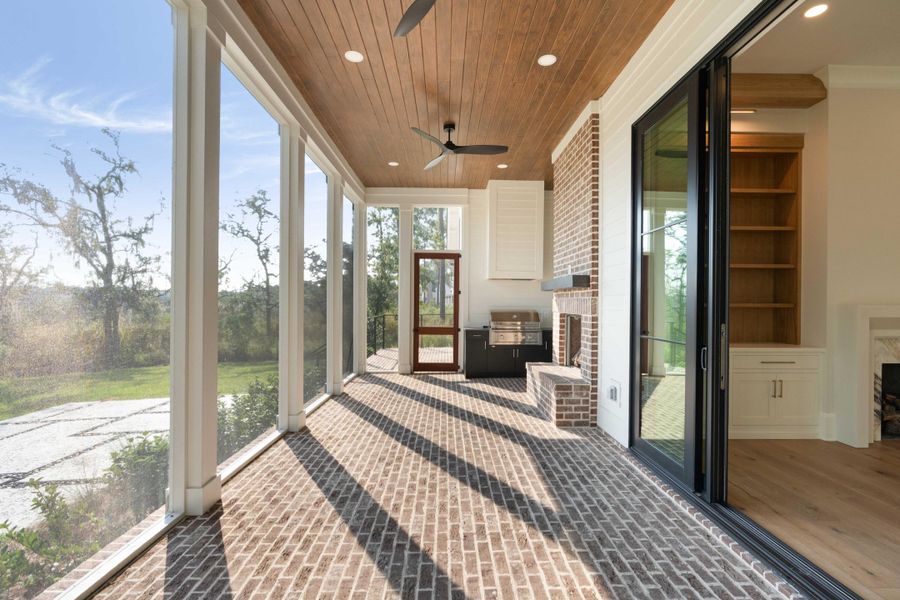 Exterior details and patio area of a home in , Ravenel (Image 34).