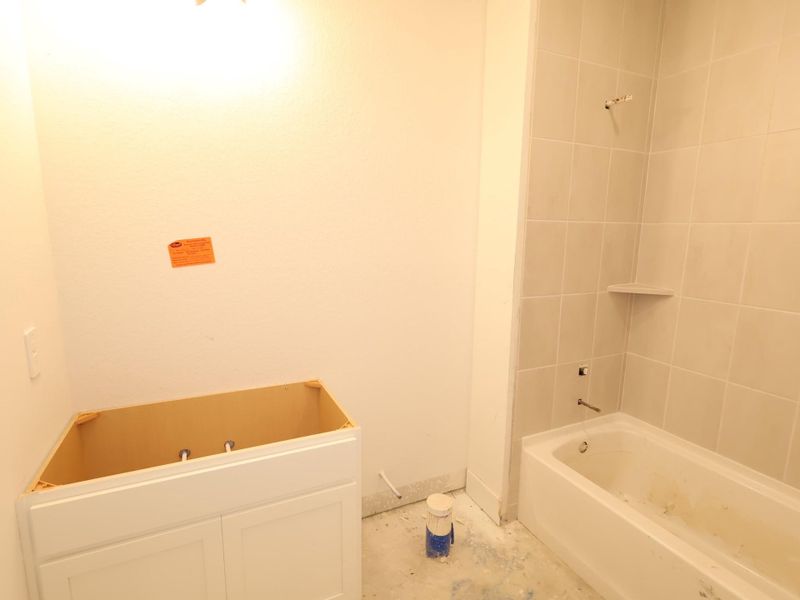 In-progress construction of a new home in Magnolia Ridge, Magnolia, TX (Image 24).