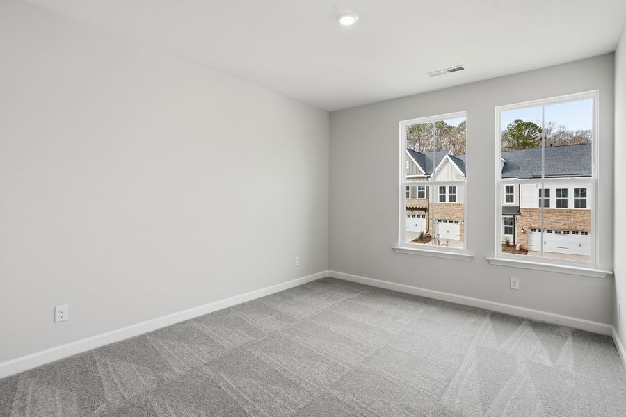 Spacious, unfurnished interior of a new home in Ovation at Sweetbrier, Durham (Image 29).
