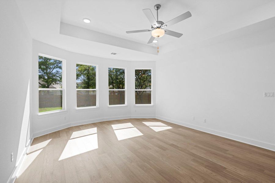 Primary Bedroom with tray ceiling