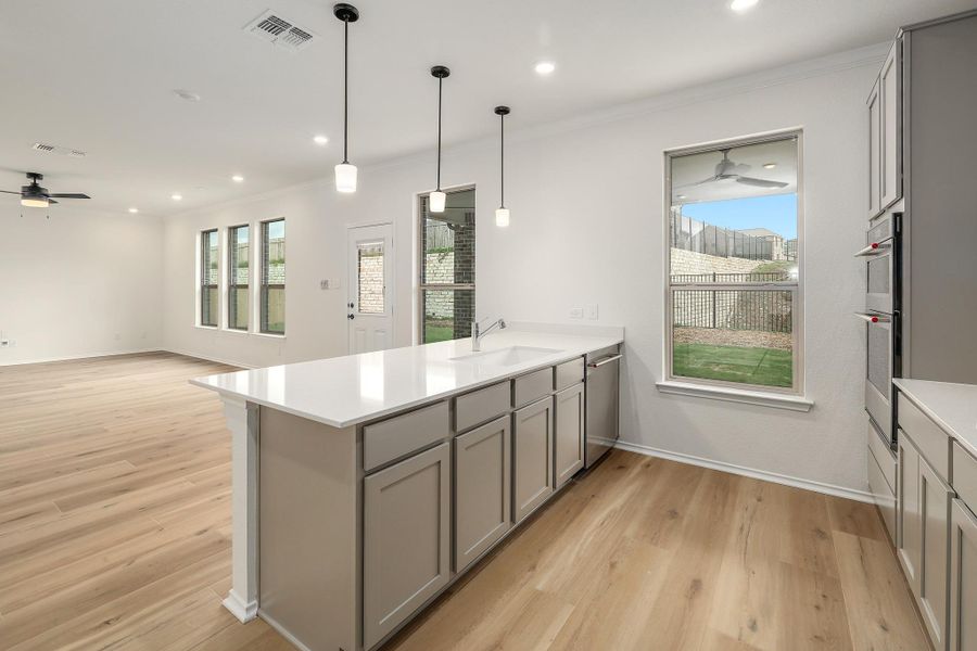 Furnished interior view inside a new home in River Bluff, Leander (Image 11).