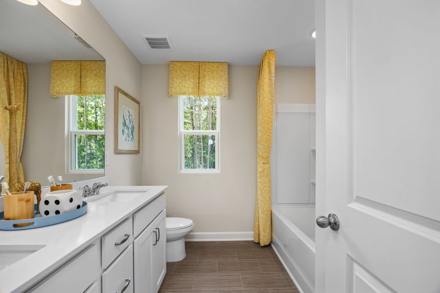 Representative furnished interior of a home built from the The Willow B by Davidson Homes LLC in Retreat at North Main, Lillington (Image 31).