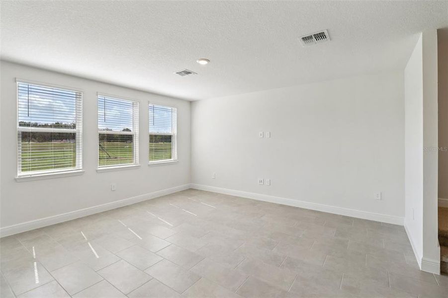 Spacious, unfurnished interior of a new home in The Reserve at Hammock Oaks - Classic Series, Lady Lake (Image 35).