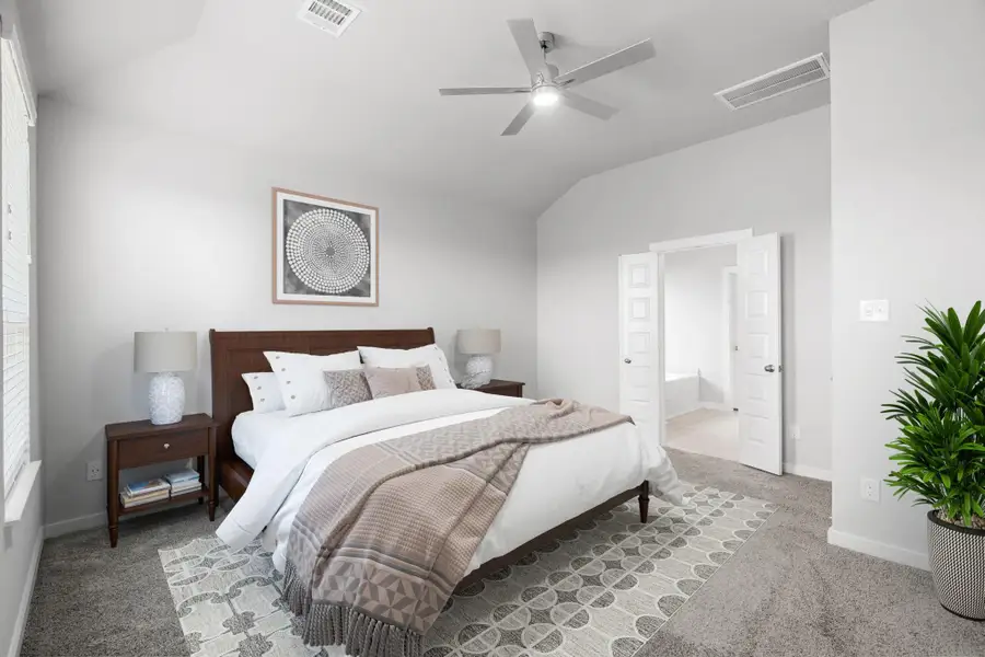 Virtually Staged - Primary Bedroom. Sample photo of completed home with similar floor plan. Actual colors and selections may vary.