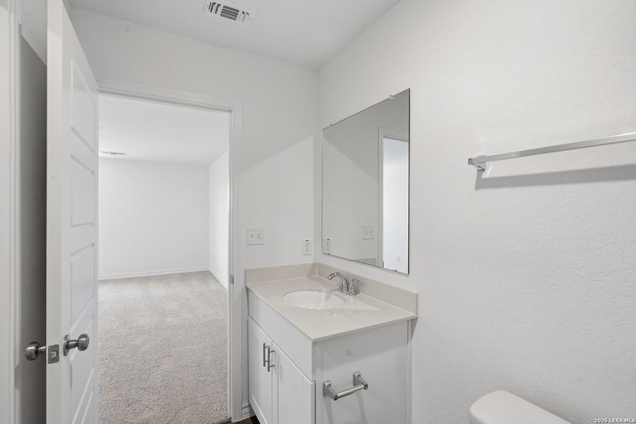 Furnished interior view inside a new home in Vista Real, Converse (Image 16).