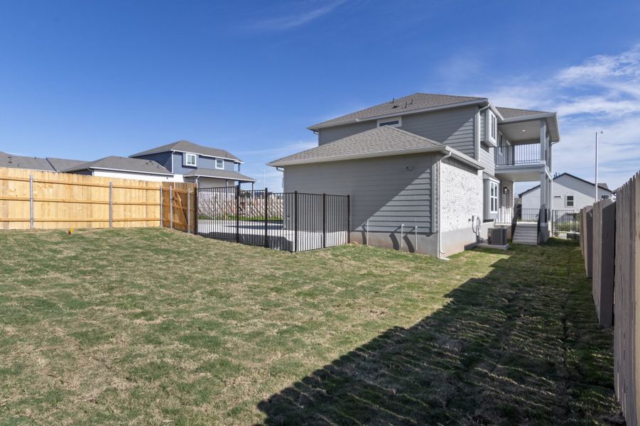 Exterior details and patio area of a home in Easton Park, Austin (Image 21).