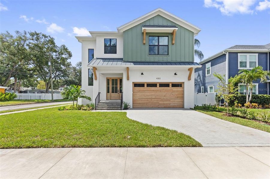 Front exterior of a new home in , Tampa, FL, highlighting curb appeal (Image 1). Front exterior of a new home in , Tampa, FL, highlighting curb appeal (Image 1).