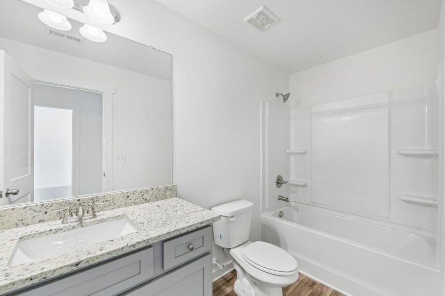 Furnished interior view inside a new home in Sutton’s Landing, Statham (Image 14).