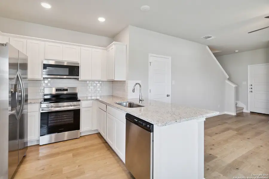 Furnished interior view inside a new home in , Converse (Image 8).