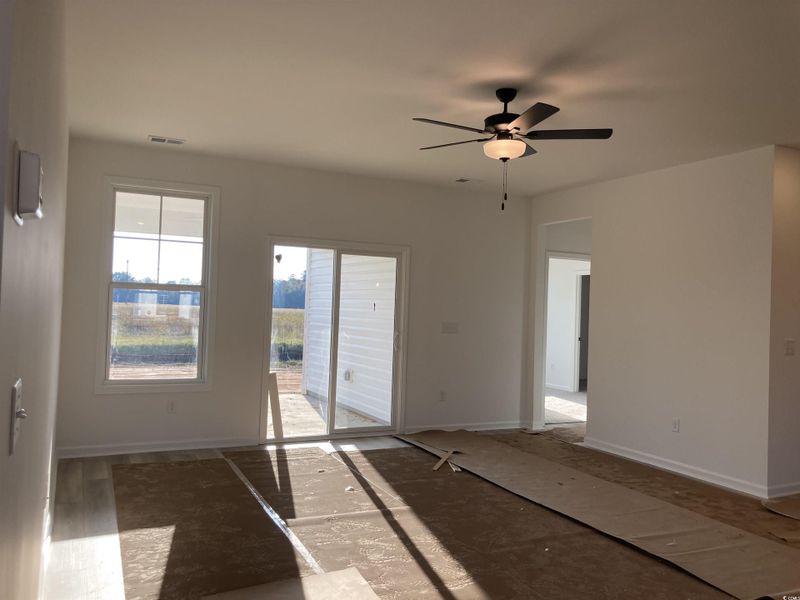 Spare room with baseboards and ceiling fan Spare room with baseboards and ceiling fan