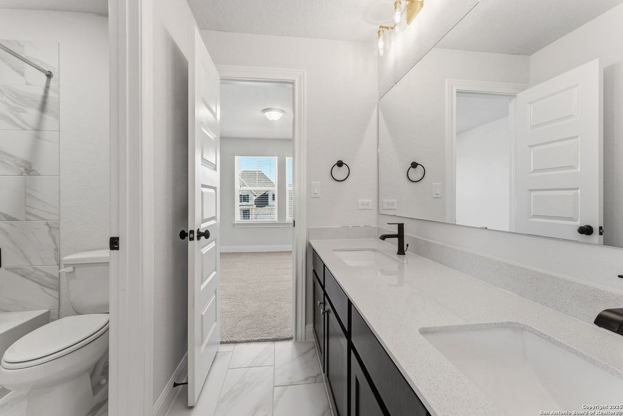 Furnished interior view inside a new home in Davis Ranch 60', San Antonio (Image 8).