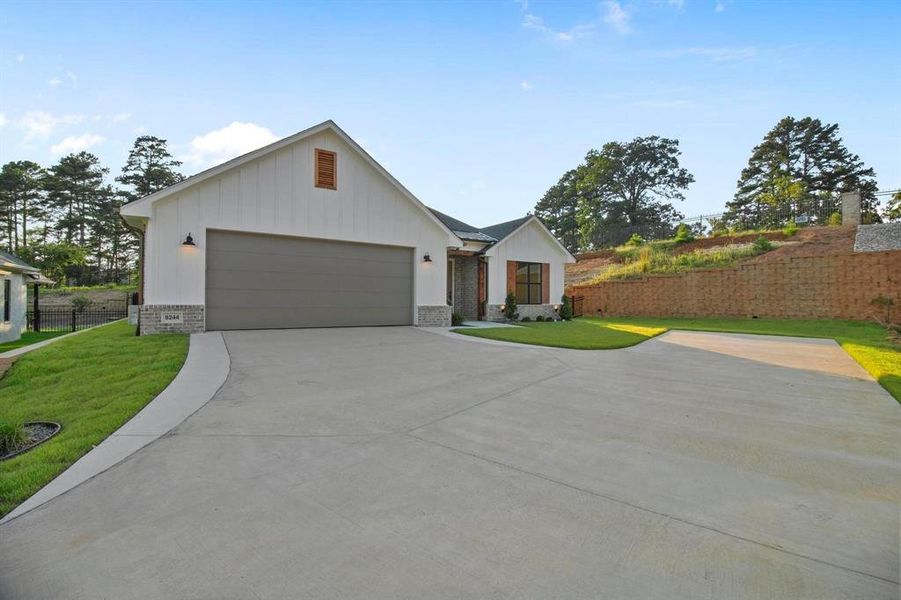 Front exterior of a new home in , Tyler, TX, highlighting curb appeal (Image 23).