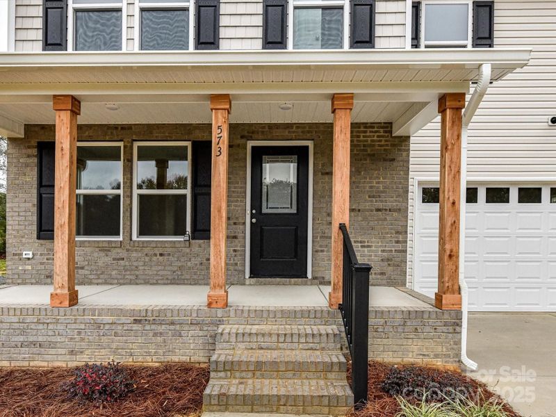Exterior details and patio area of a home in , Oakboro (Image 22).
