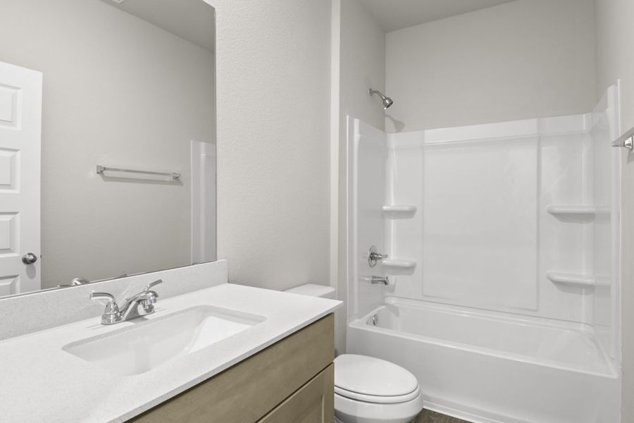 Image of bathroom with a shower and tub and a mirror with vanity Image of bathroom with a shower and tub and a mirror with vanity