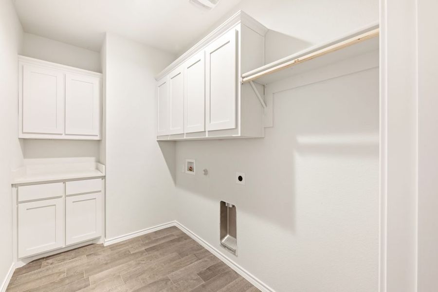 Representative exterior photo of a completed home built from the Radcliffe II by Impression Homes in Stone Eagle, Azle, TX (Image 26).