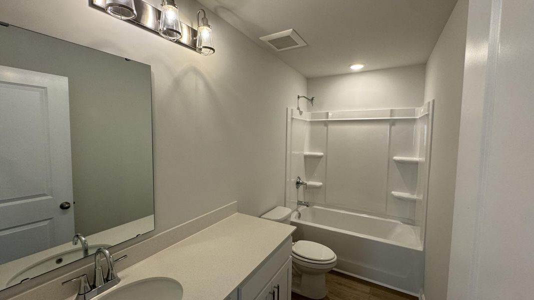 Furnished interior view inside a new home in Watson Hill, Summerville (Image 12).