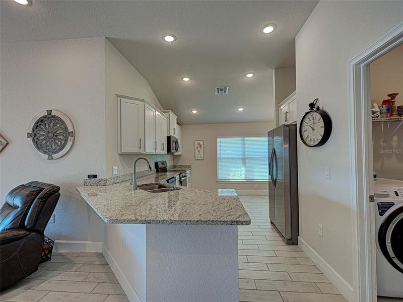 Furnished interior view inside a new home in Watercress Cove, North Port (Image 9).