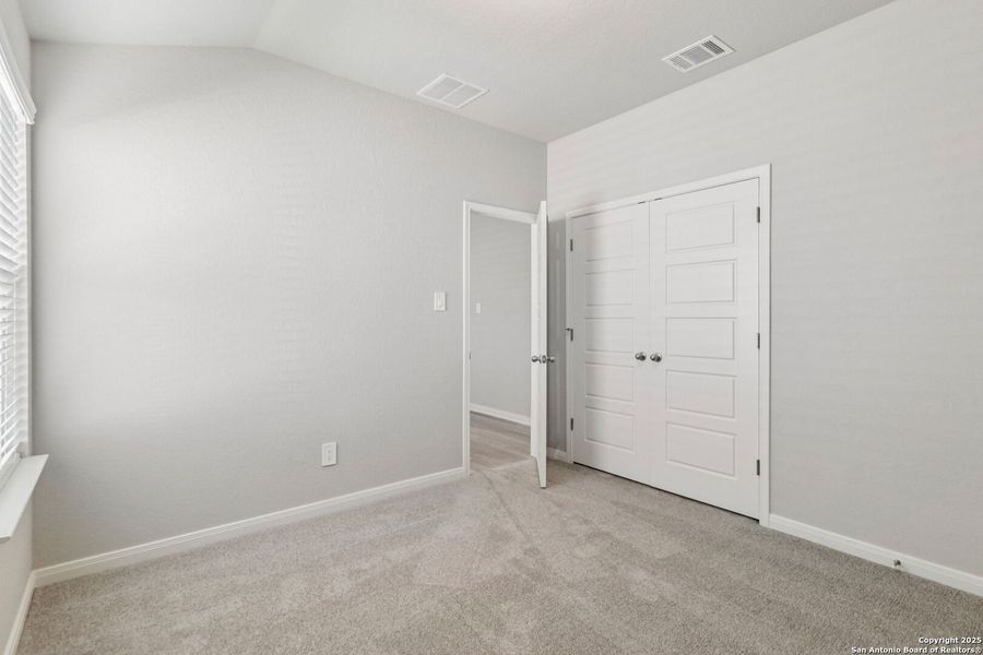 Spacious, unfurnished interior of a new home in Estancia Ranch - Premier Series, San Antonio (Image 30).