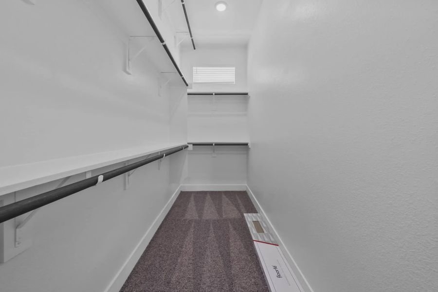 Representative unfurnished interior of a home built from the Versailles by Chesmar Homes in Meridiana Chateau, Manvel (Image 36).
