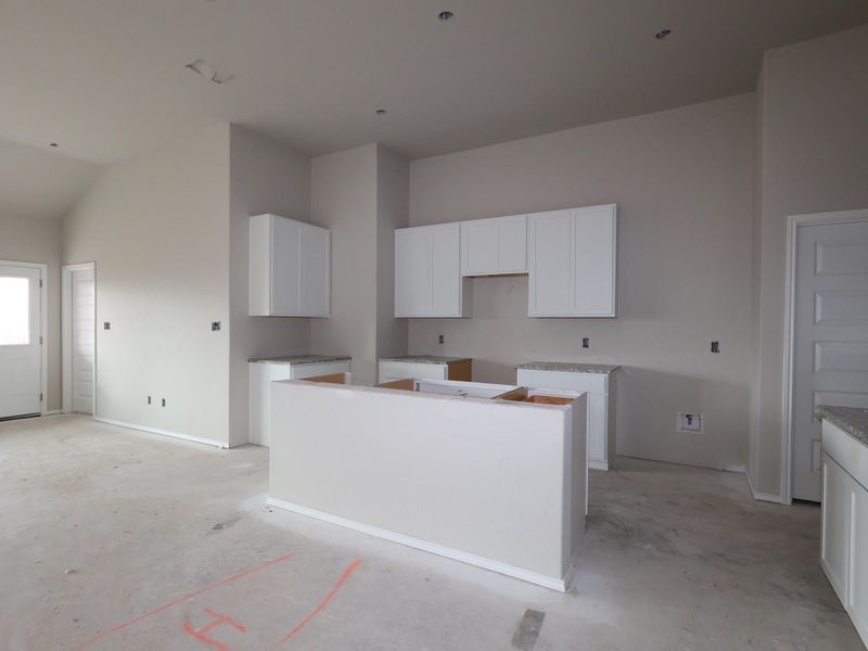 In-progress construction of a new home in Carillon, Manor, TX (Image 12).