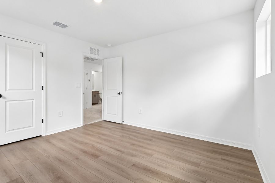 Representative unfurnished interior of a home built from the Florence by Hartizen Homes in Estes Reserve, Eustis (Image 95). Representative unfurnished interior of a home built from the Florence by Hartizen Homes in Estes Reserve, Eustis (Image 95).