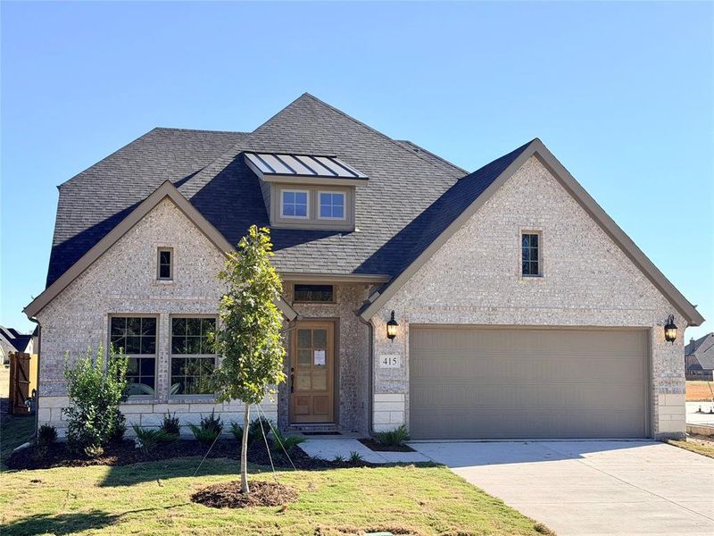 Warm curb appeal for this elegant home with all of the latest color choices. Warm curb appeal for this elegant home with all of the latest color choices.