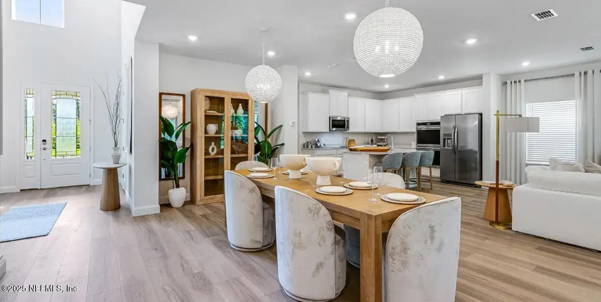 Furnished interior view inside a new home in Russell Retreat, Green Cove Springs (Image 11).