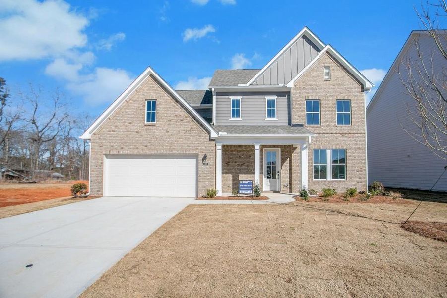 Front exterior of a new home in Maddox Landing, Hoschton, GA, highlighting curb appeal (Image 1). Front exterior of a new home in Maddox Landing, Hoschton, GA, highlighting curb appeal (Image 1).