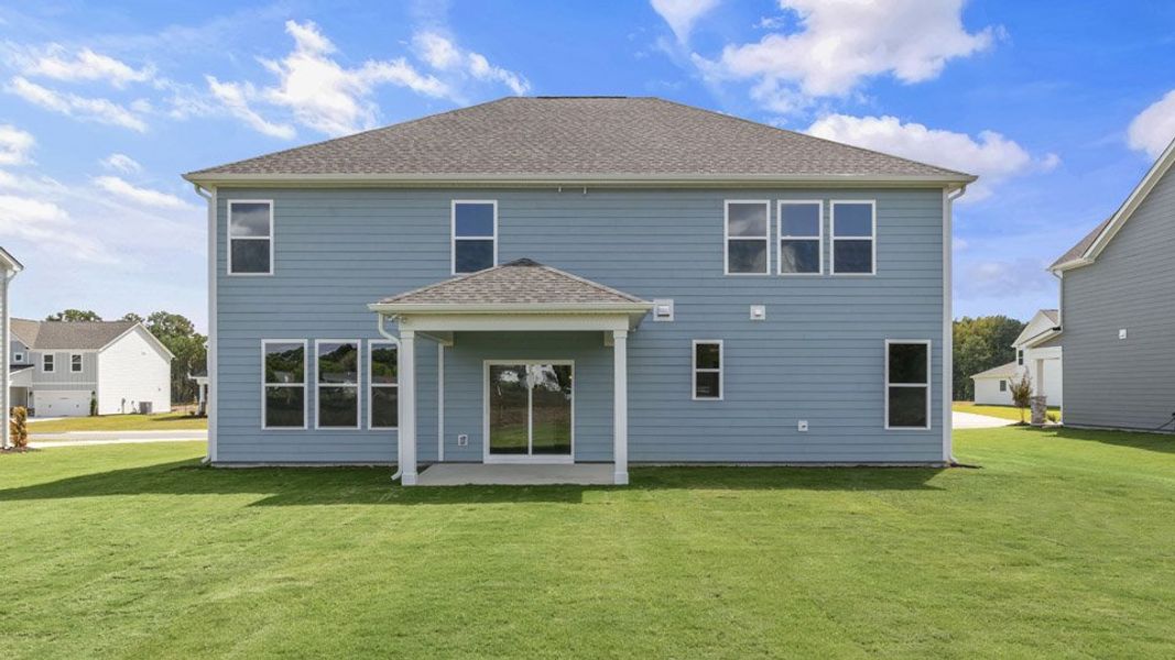 Representative exterior photo of a completed home built from the NORMAN by D.R. Horton in Eagle Creek, Fuquay Varina, NC (Image 17).
