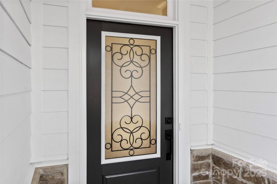 Exterior details and patio area of a home in Sheffield, Indian Trail (Image 2).
