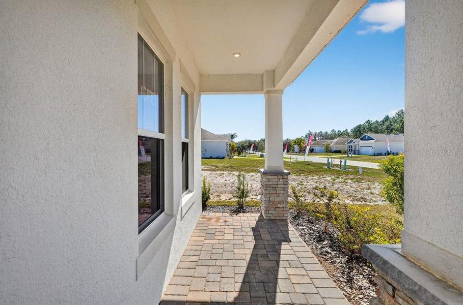 Exterior details and patio area of a home in Gray Hawk at Hole Two, Daytona Beach (Image 31).