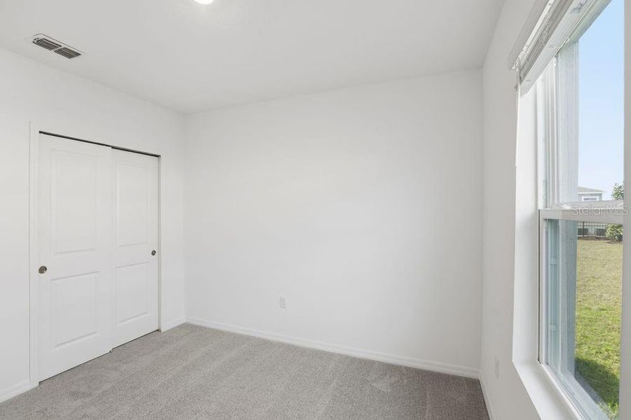 Spacious, unfurnished interior of a new home in Waterstone, Groveland (Image 40).