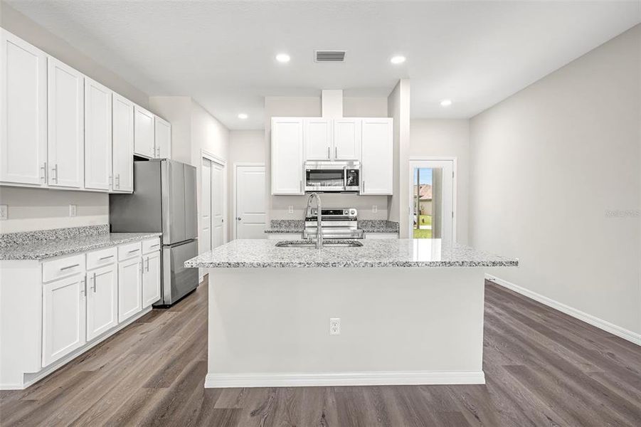 Furnished interior view inside a new home in , Weeki Wachee (Image 16).
