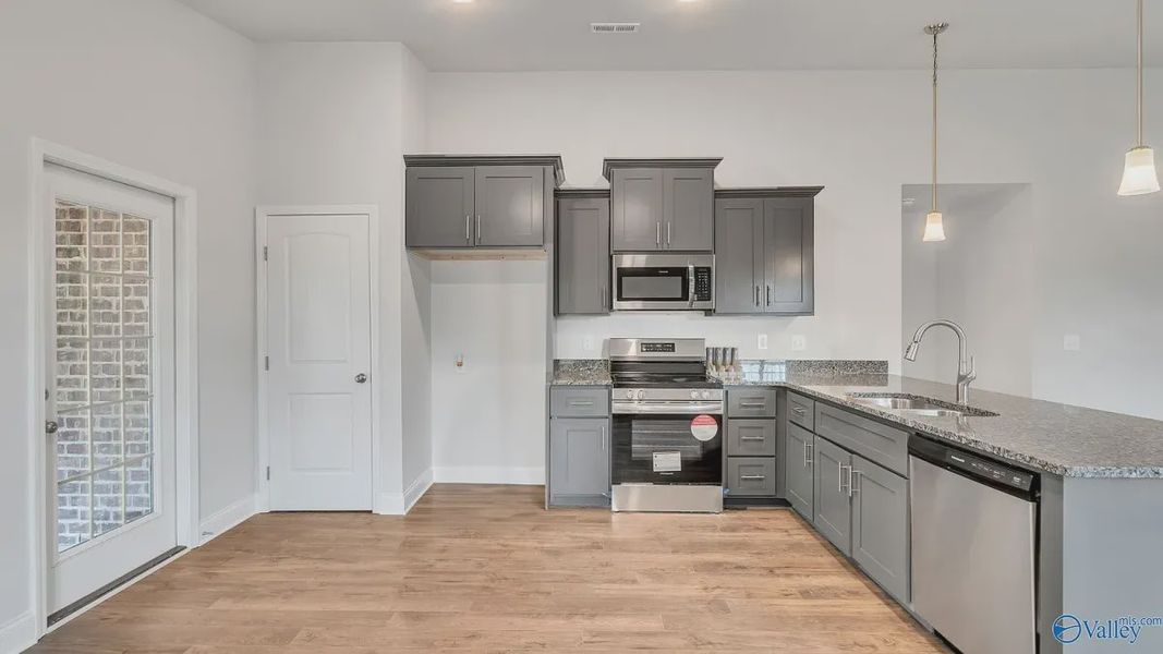 Representative furnished interior of a home built from the Plan 1434 by Adams Homes in Waverly Place, Richlands (Image 6).