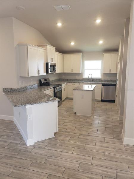Furnished interior view inside a new home in Pine Bluff, Spring Hill (Image 3). Furnished interior view inside a new home in Pine Bluff, Spring Hill (Image 3).