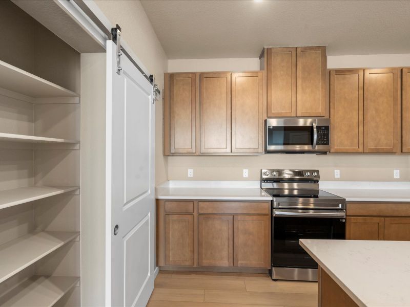 Furnished interior view inside a new home in Gateway Commons, Denver (Image 7).