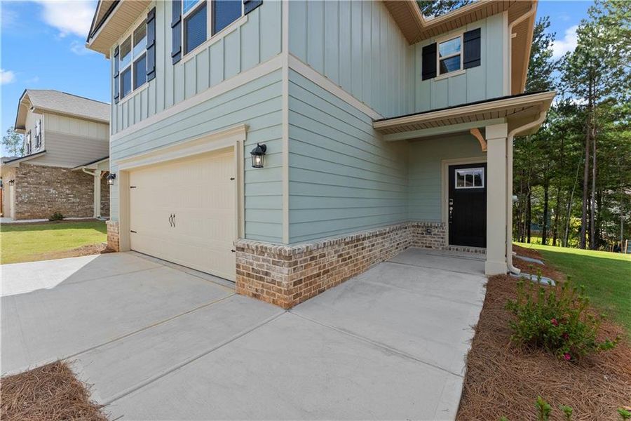 Exterior details and patio area of a home in Magnolia Villas, Cornelia (Image 4). Exterior details and patio area of a home in Magnolia Villas, Cornelia (Image 4).