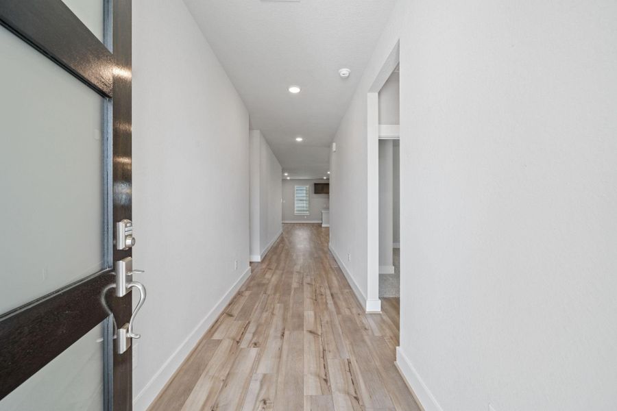 As you step through the front door, you're greeted by a bright and inviting entryway that truly sets the stage for what’s to come. As you step through the front door, you're greeted by a bright and inviting entryway that truly sets the stage for what’s to come.