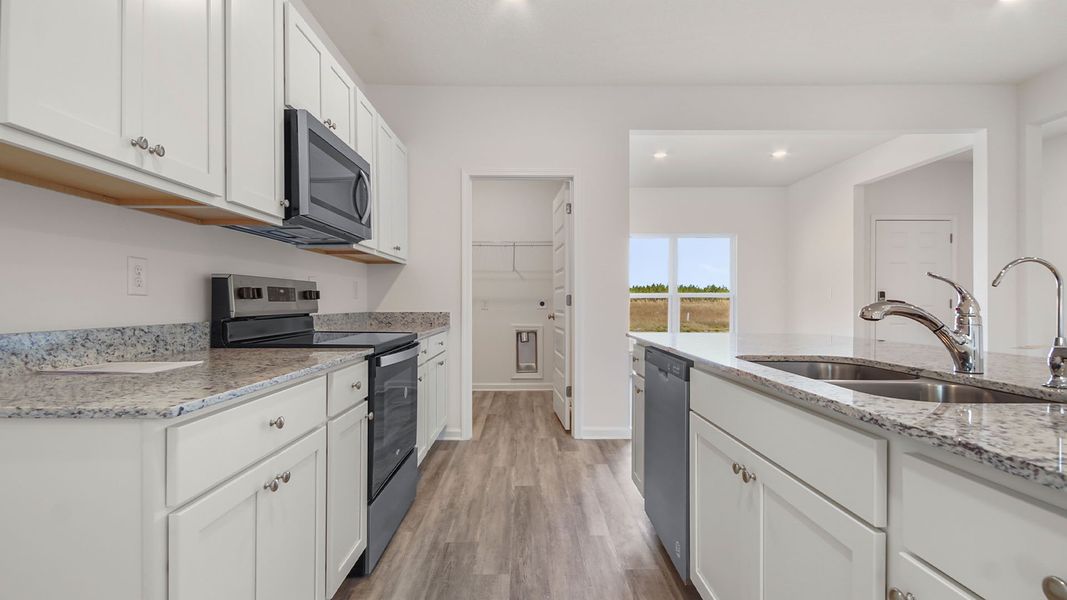 Furnished interior view inside a new home in Owl's Head East, Freeport (Image 5).