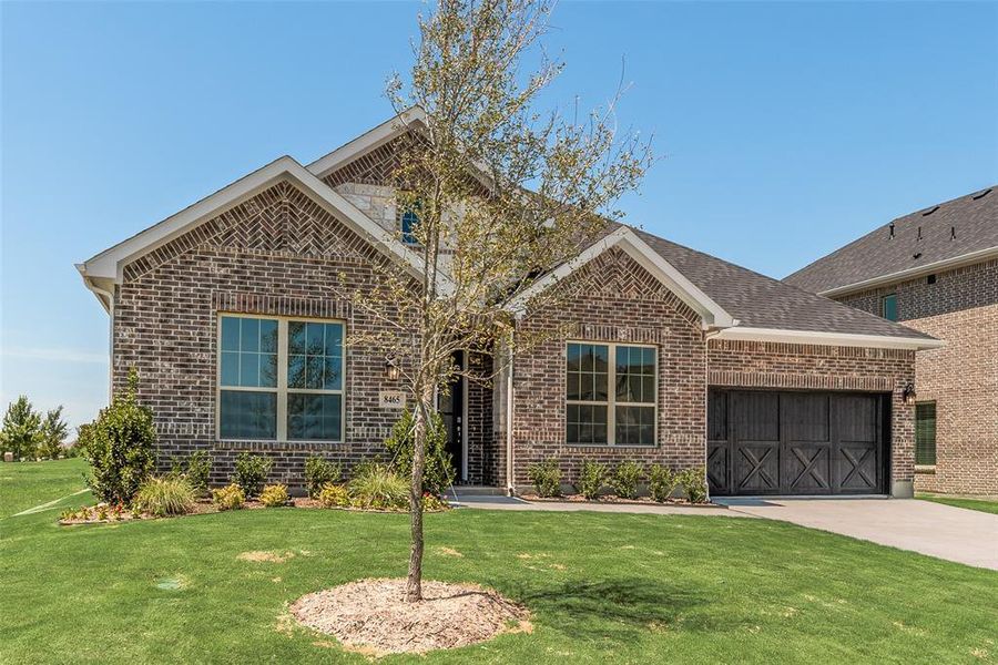 Front exterior of a new home in Villages of Creekwood, Frisco, TX, highlighting curb appeal (Image 17). Front exterior of a new home in Villages of Creekwood, Frisco, TX, highlighting curb appeal (Image 17).