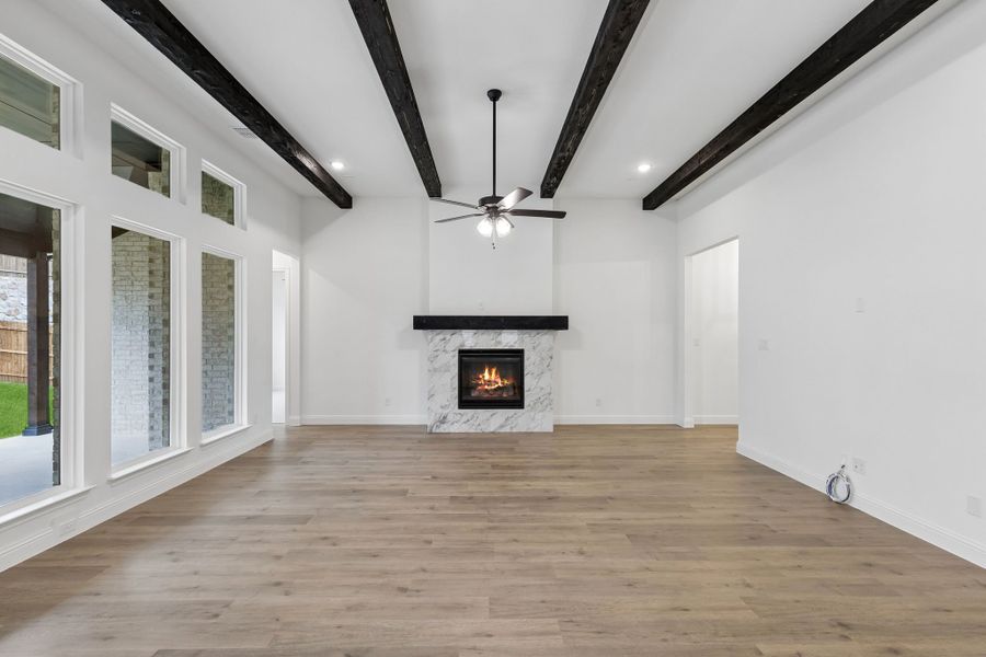 Representative unfurnished interior of a home built from the Pecos by Sandlin Homes in Settler's Glen, New Fairview (Image 23).