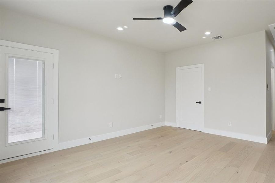 Game room featuring light wood-type flooring, ceiling fan, and recessed lighting