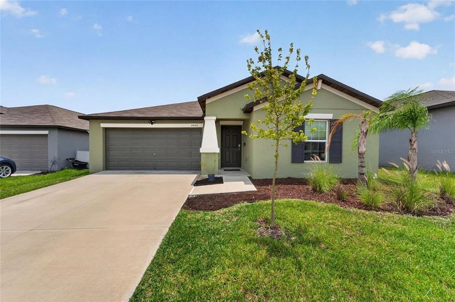 Front exterior of a new home in , Bartow, FL, highlighting curb appeal (Image 27).
