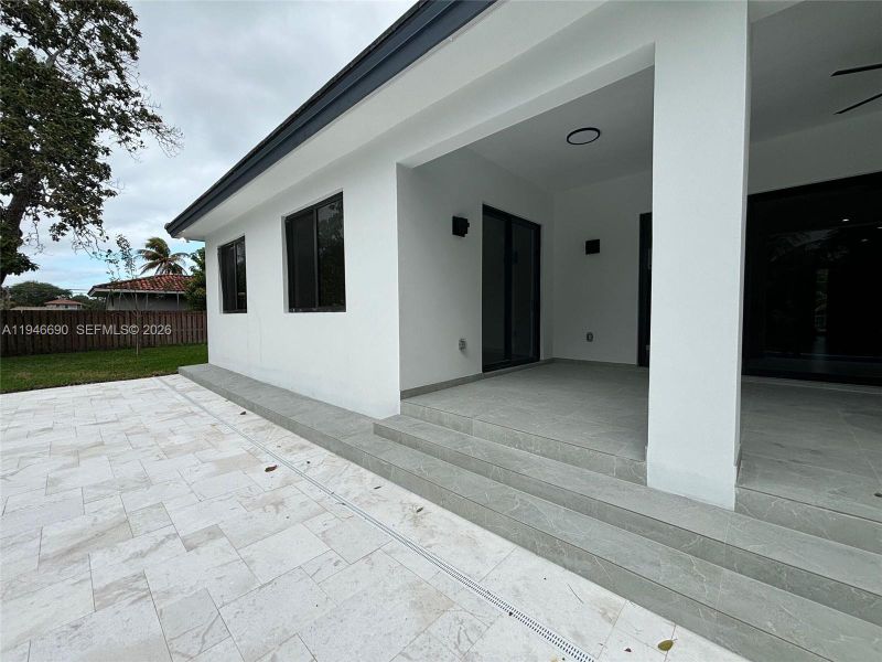 Exterior details and patio area of a home in , Miami (Image 3). Exterior details and patio area of a home in , Miami (Image 3).
