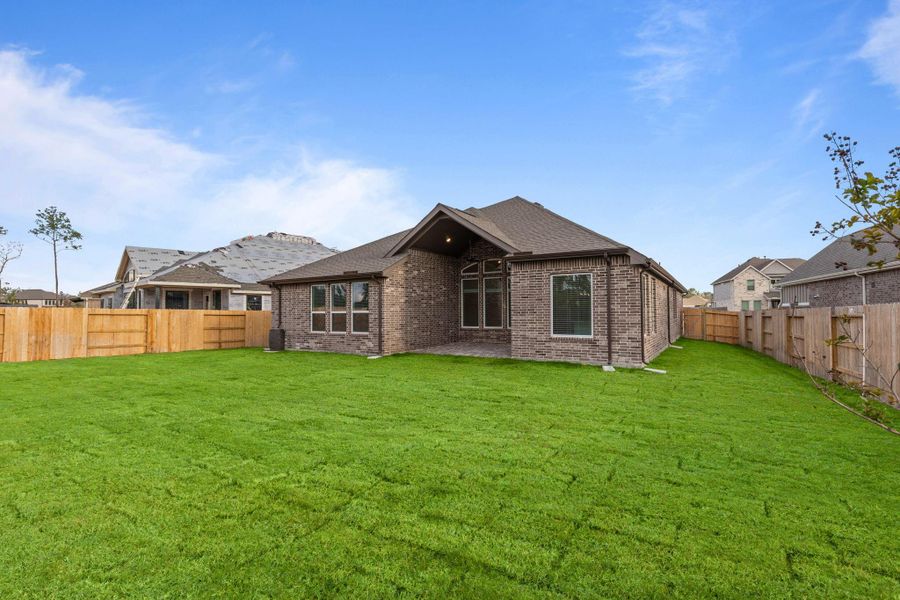 Exterior details and patio area of a home in Artavia, Conroe (Image 18). Exterior details and patio area of a home in Artavia, Conroe (Image 18).