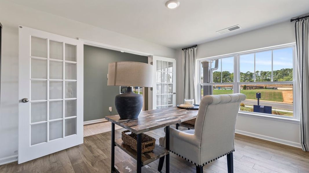 Representative furnished interior of a home built from the Belhaven by D.R. Horton in Rocky River Ridge, Anderson (Image 9).